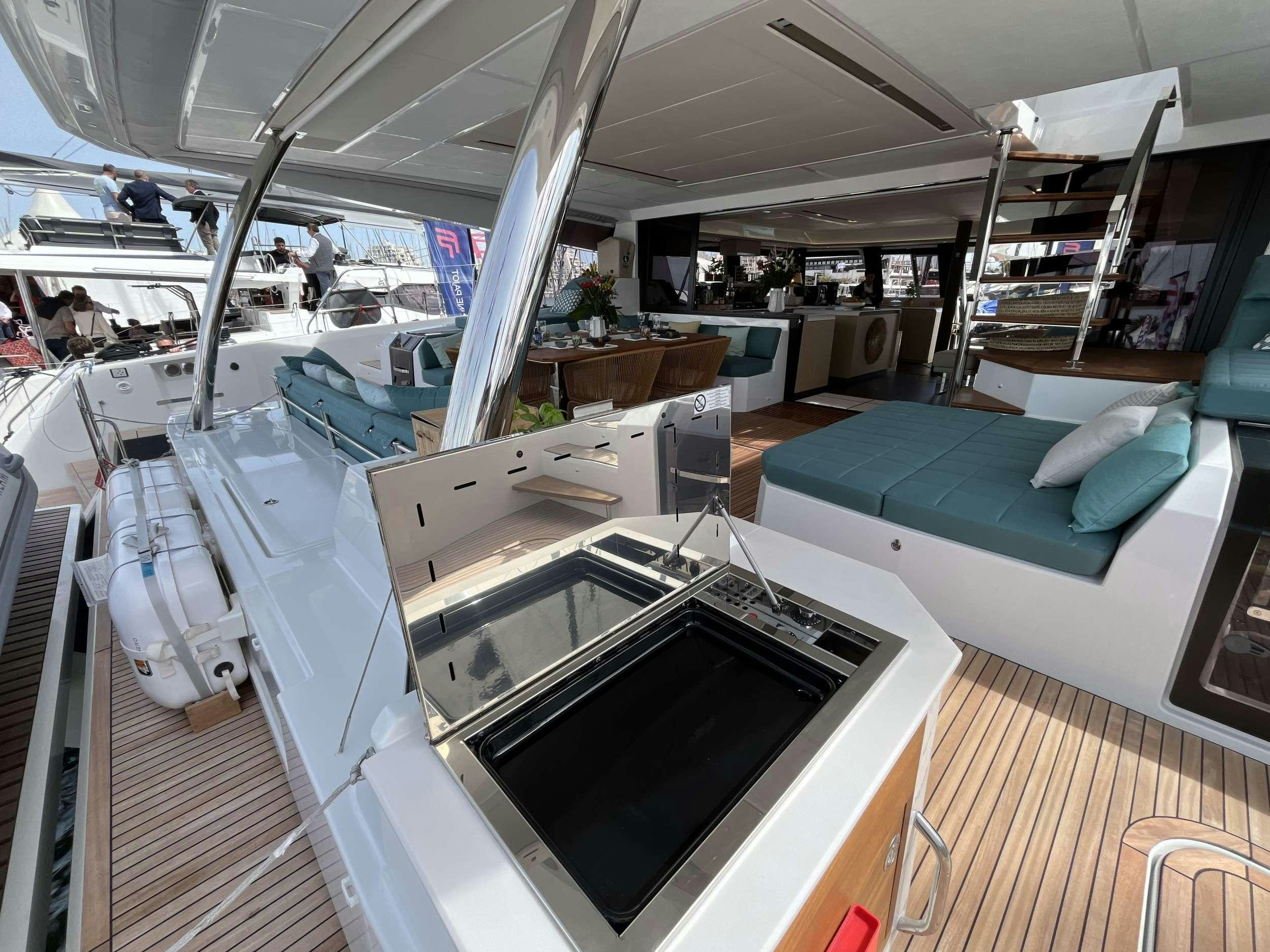 a room with a large white tub aboard THE BLUE DREAM Yacht for Charter
