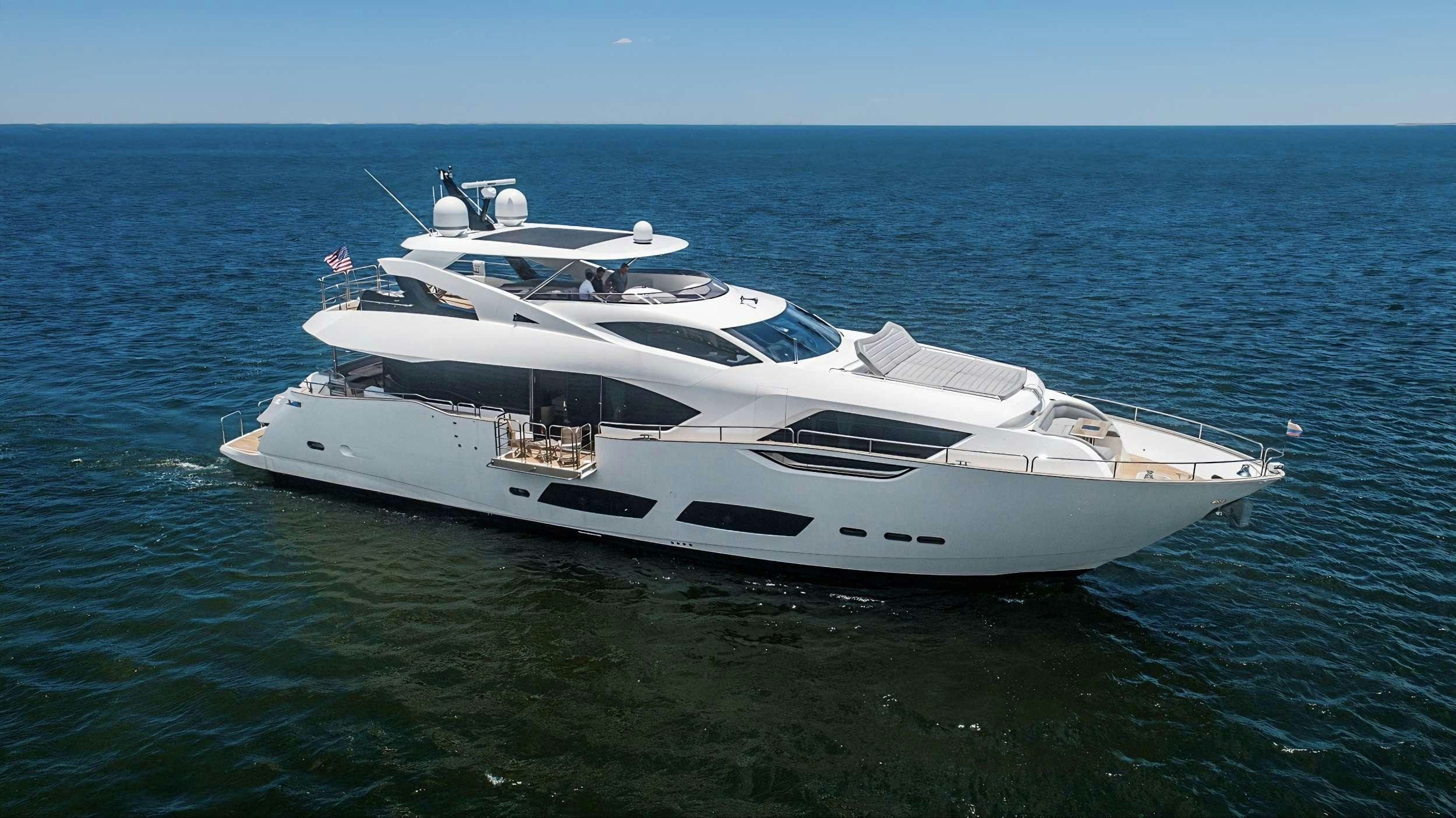 a white yacht in the water aboard QUANTUM Yacht for Charter