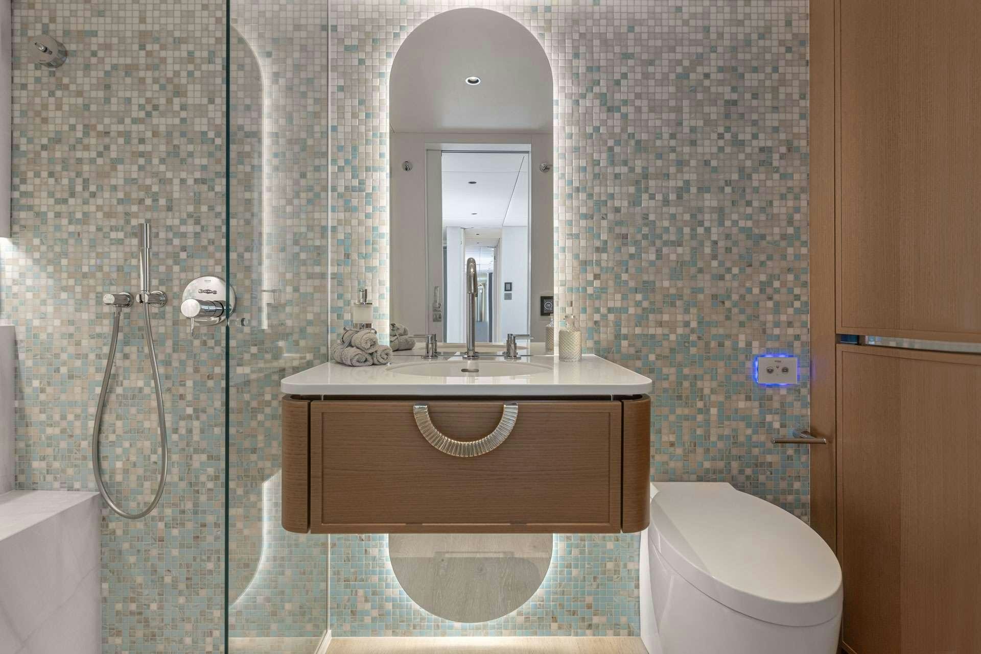 a bathroom with a sink and a toilet aboard MISCHIEVOUS Yacht for Charter