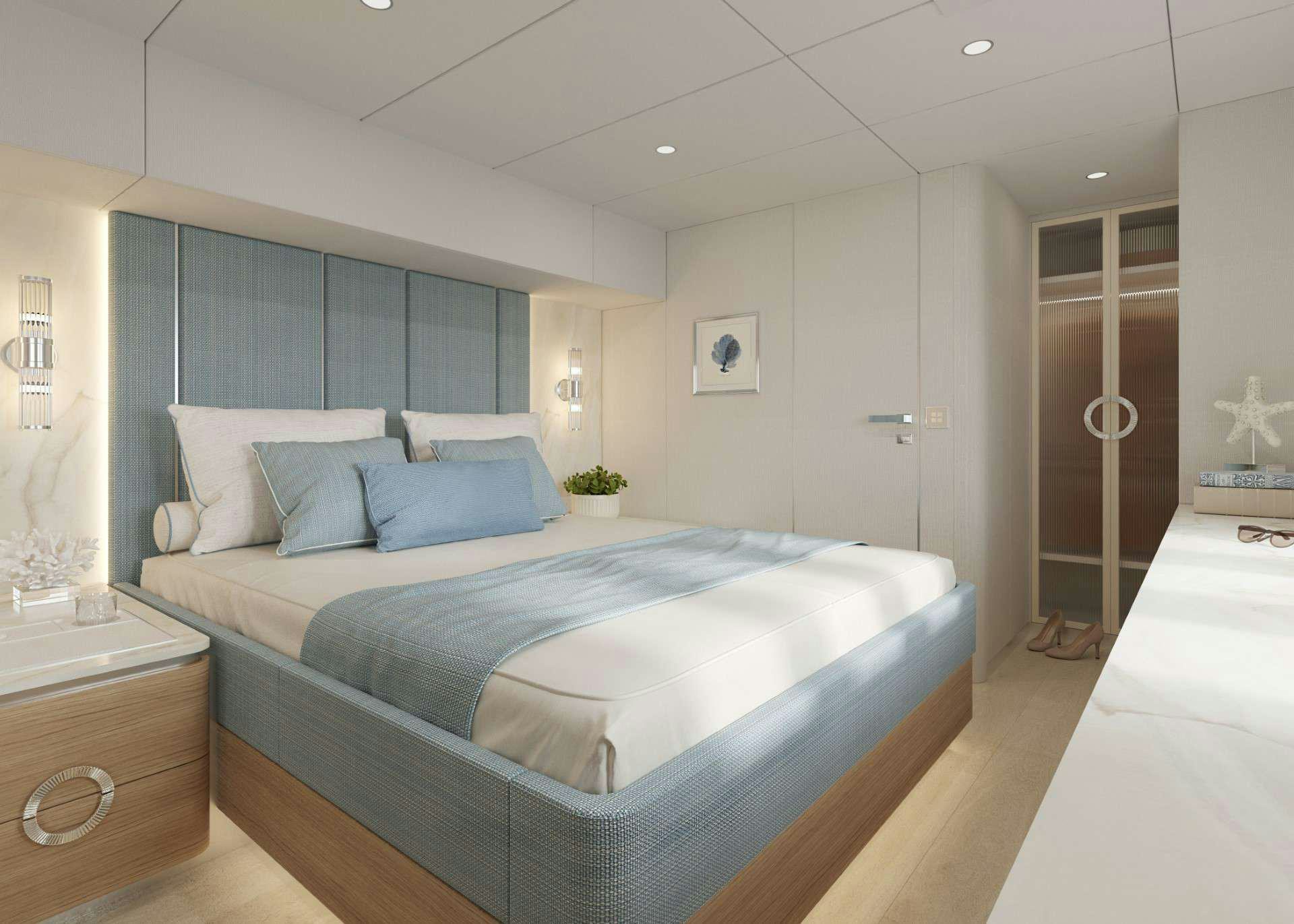 a large bedroom with a large bed aboard MISCHIEVOUS Yacht for Charter