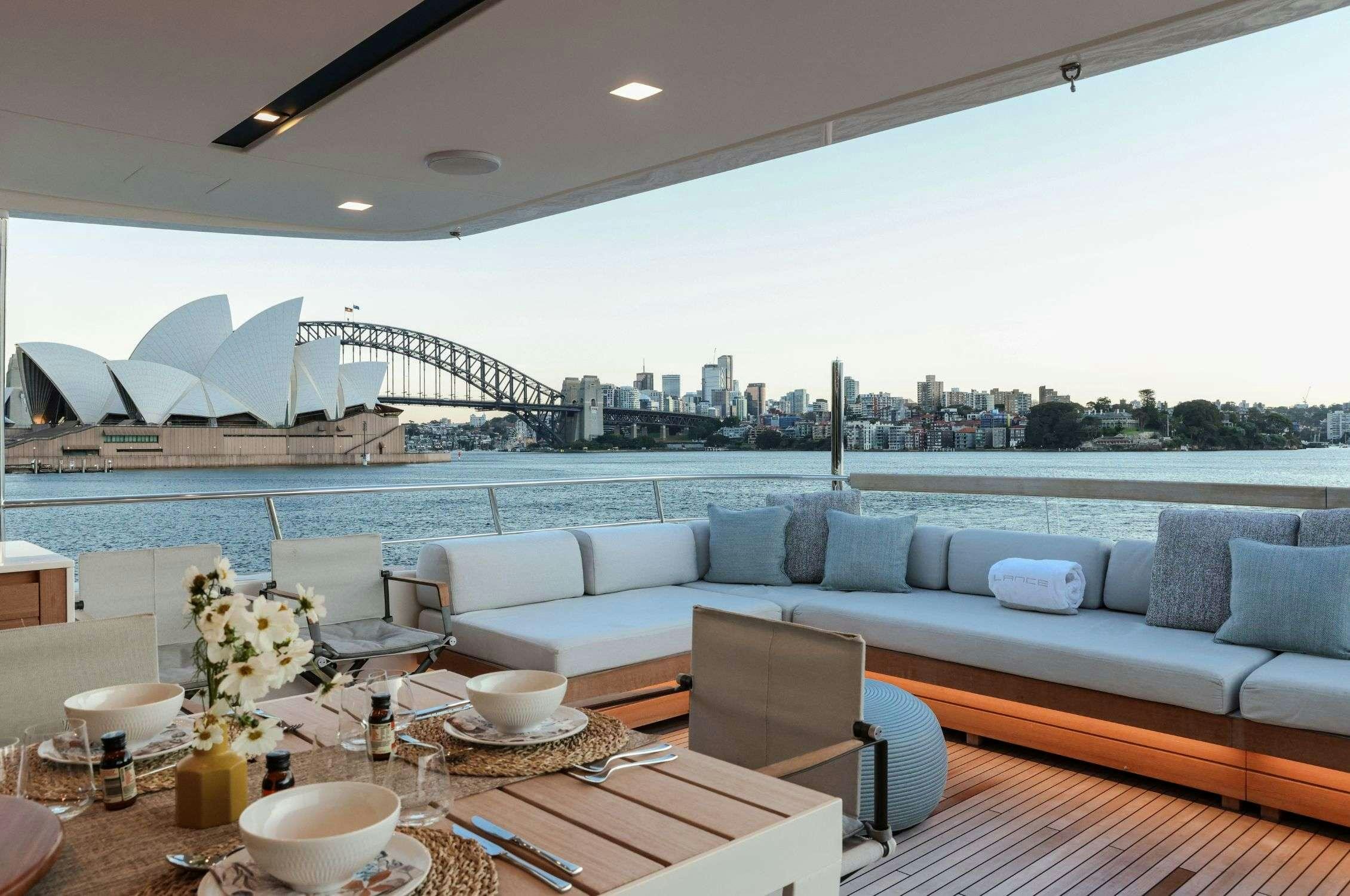 a living room with a large patio aboard LANCE Yacht for Charter