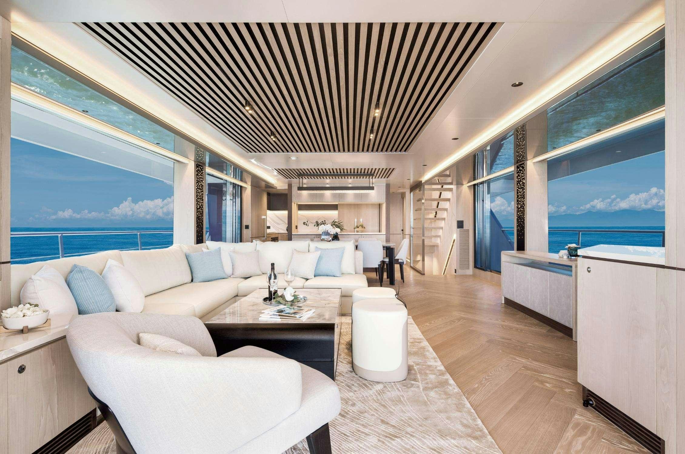 a modern looking living room aboard AURA Yacht for Charter