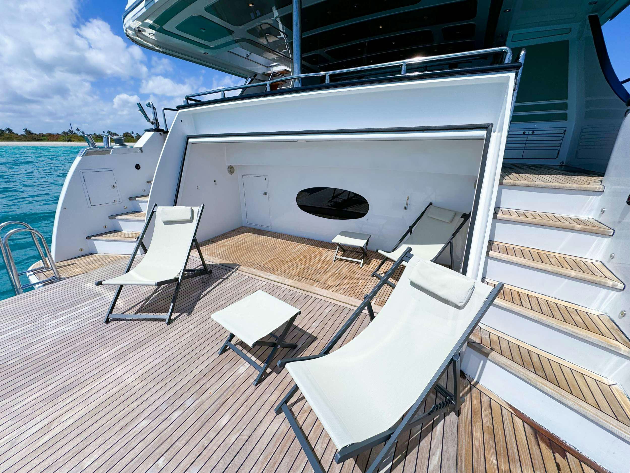 a deck with a large boat on it aboard PRIVILEGE Yacht for Charter