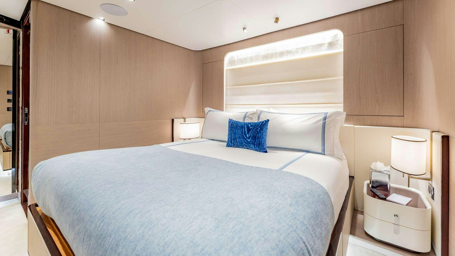 a bed in a room aboard 4 PLAY Yacht for Charter
