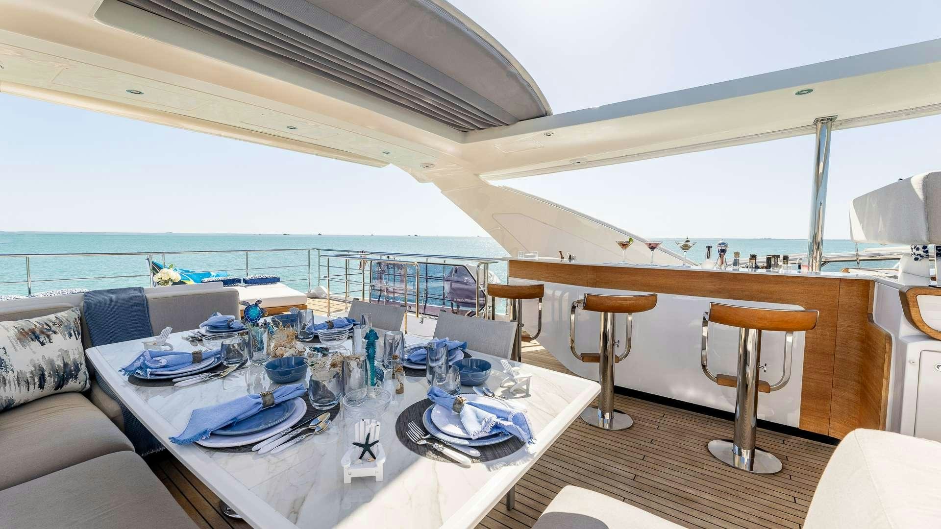 a dining table on a boat aboard 4 PLAY Yacht for Charter