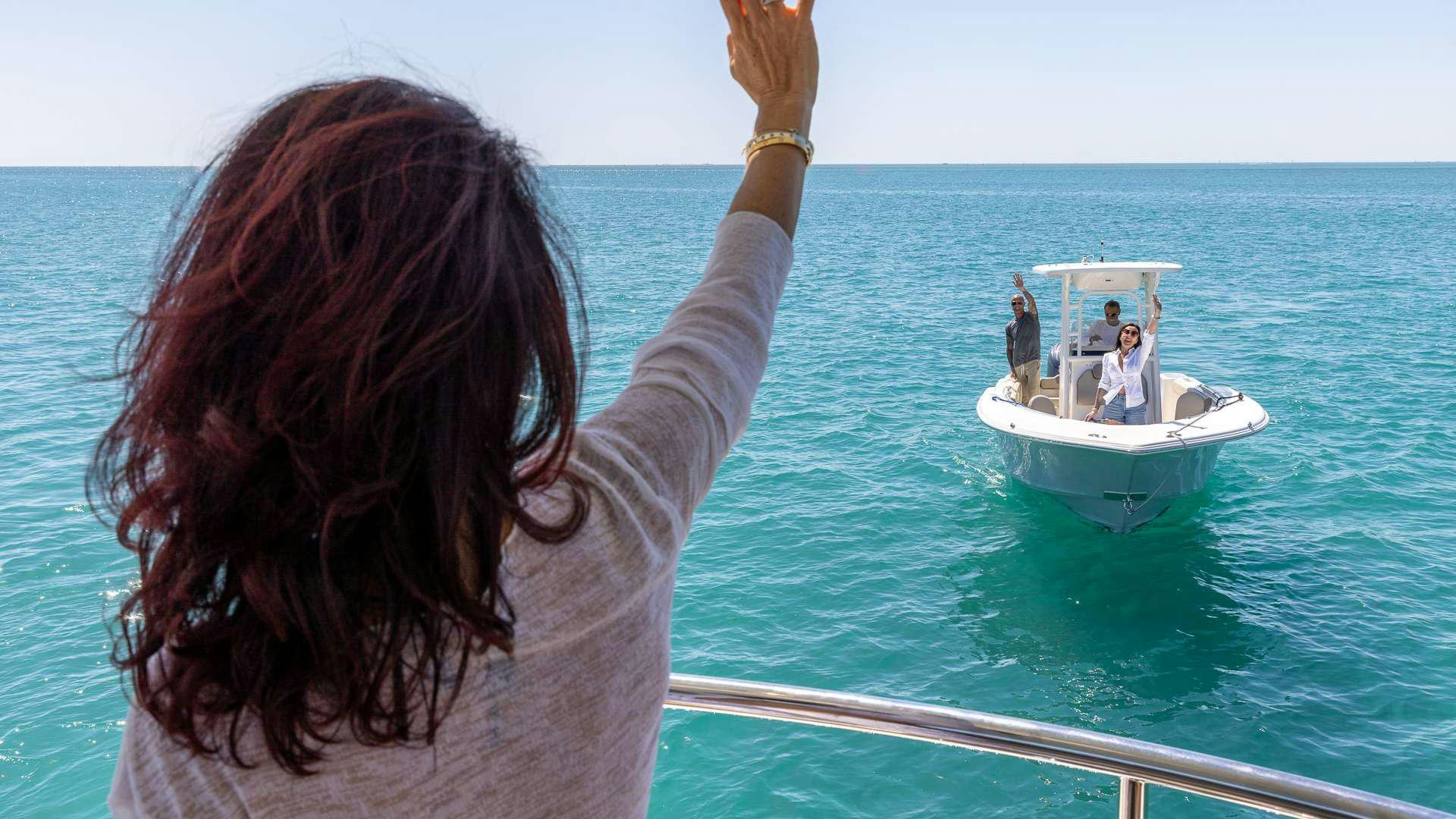 a person standing on a boat aboard 4 PLAY Yacht for Charter