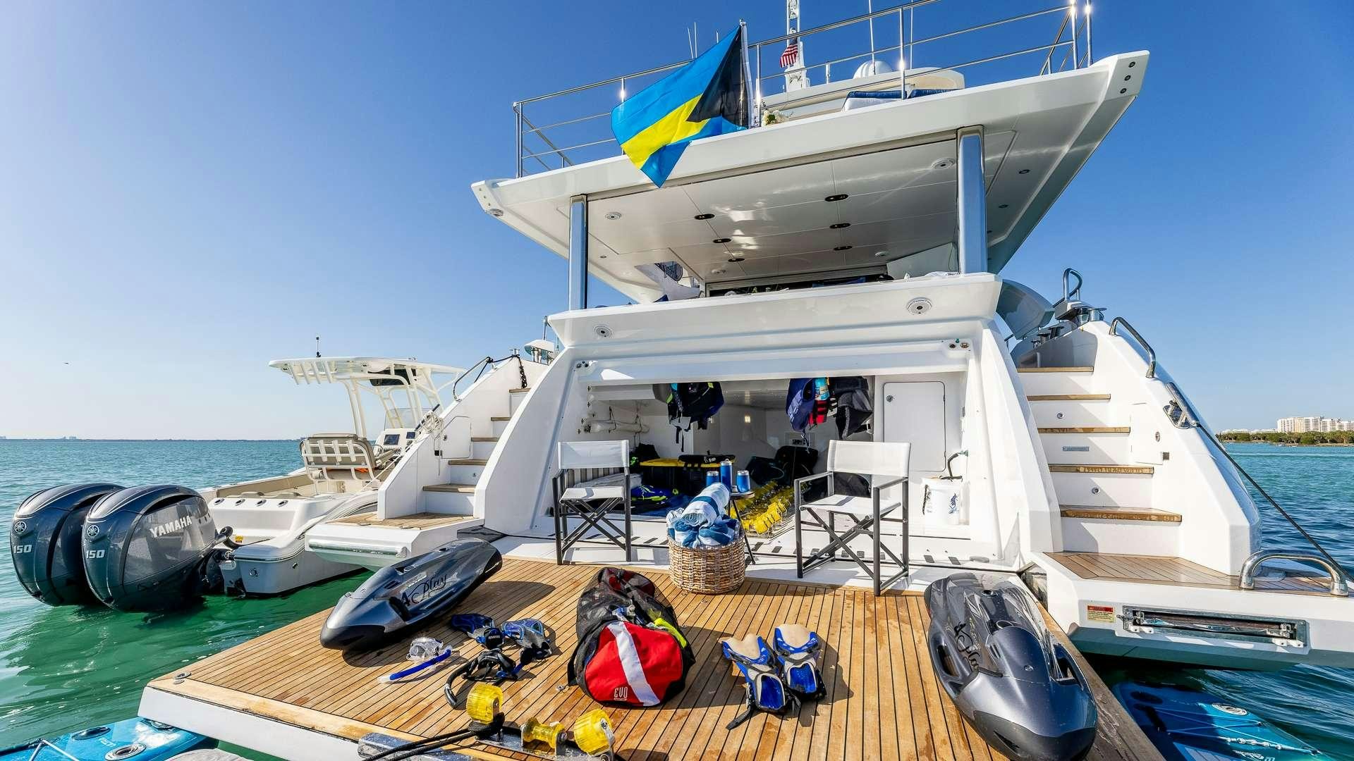 a boat docked at a pier aboard 4 PLAY Yacht for Charter