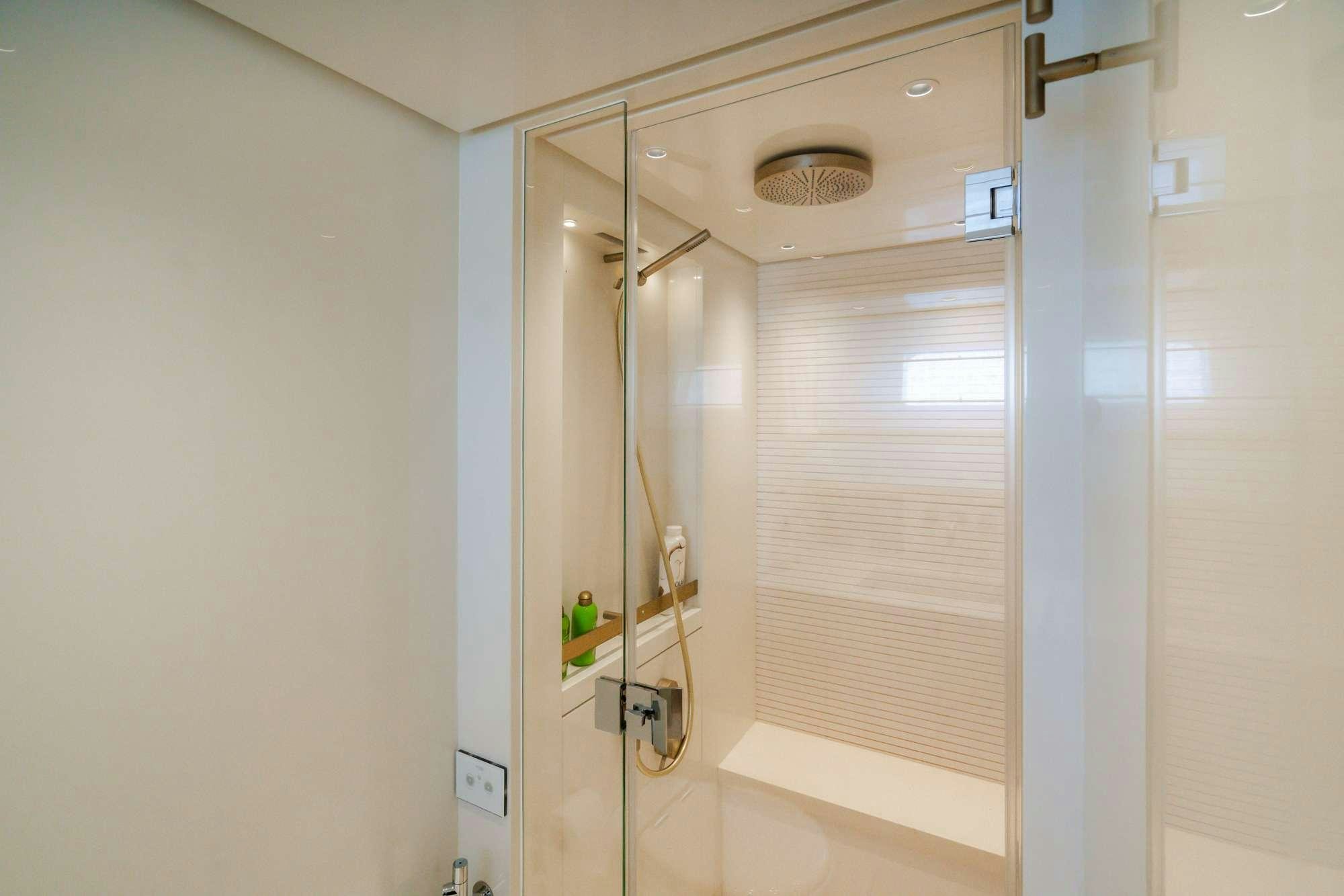 a closet with a door and a window aboard QUARANTENA Yacht for Charter