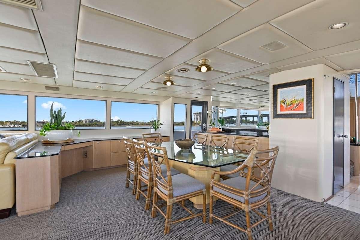 a large kitchen and dining area aboard MISS EMILY Yacht for Charter