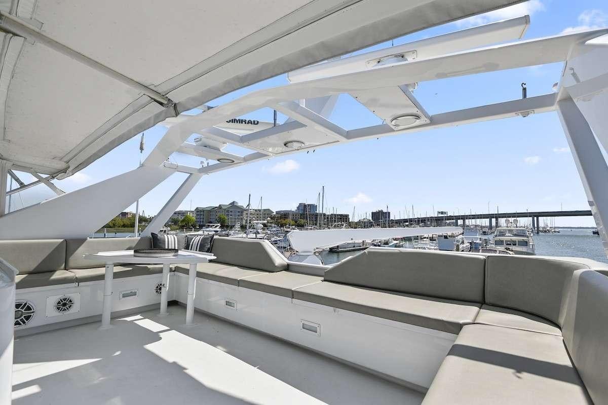 a view of a city from the roof of a building aboard MISS EMILY Yacht for Charter