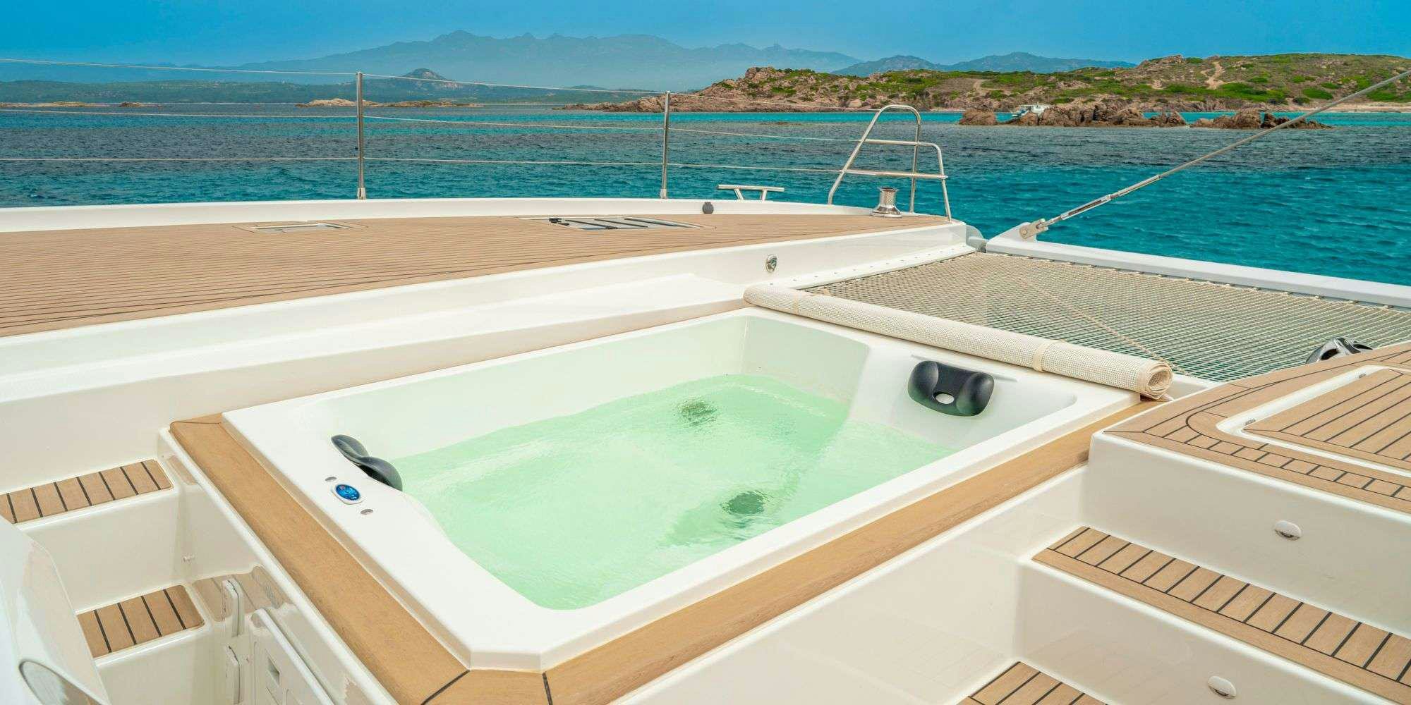 a pool on a beach aboard SEMPER FIDELIS Yacht for Charter