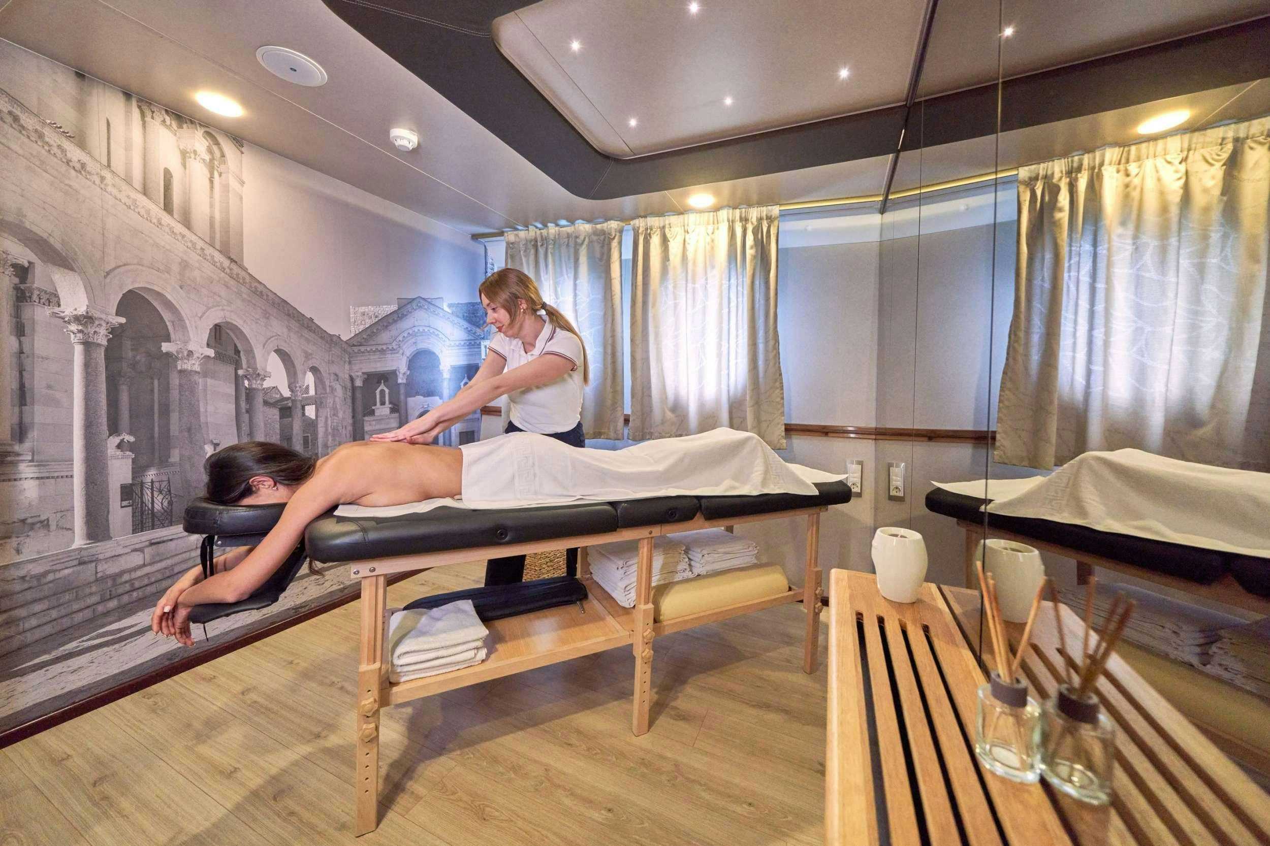 a person doing yoga in a room aboard CASABLANCA Yacht for Charter