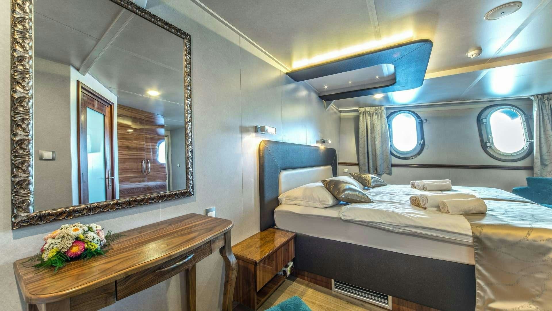 a room with two beds aboard CASABLANCA Yacht for Charter