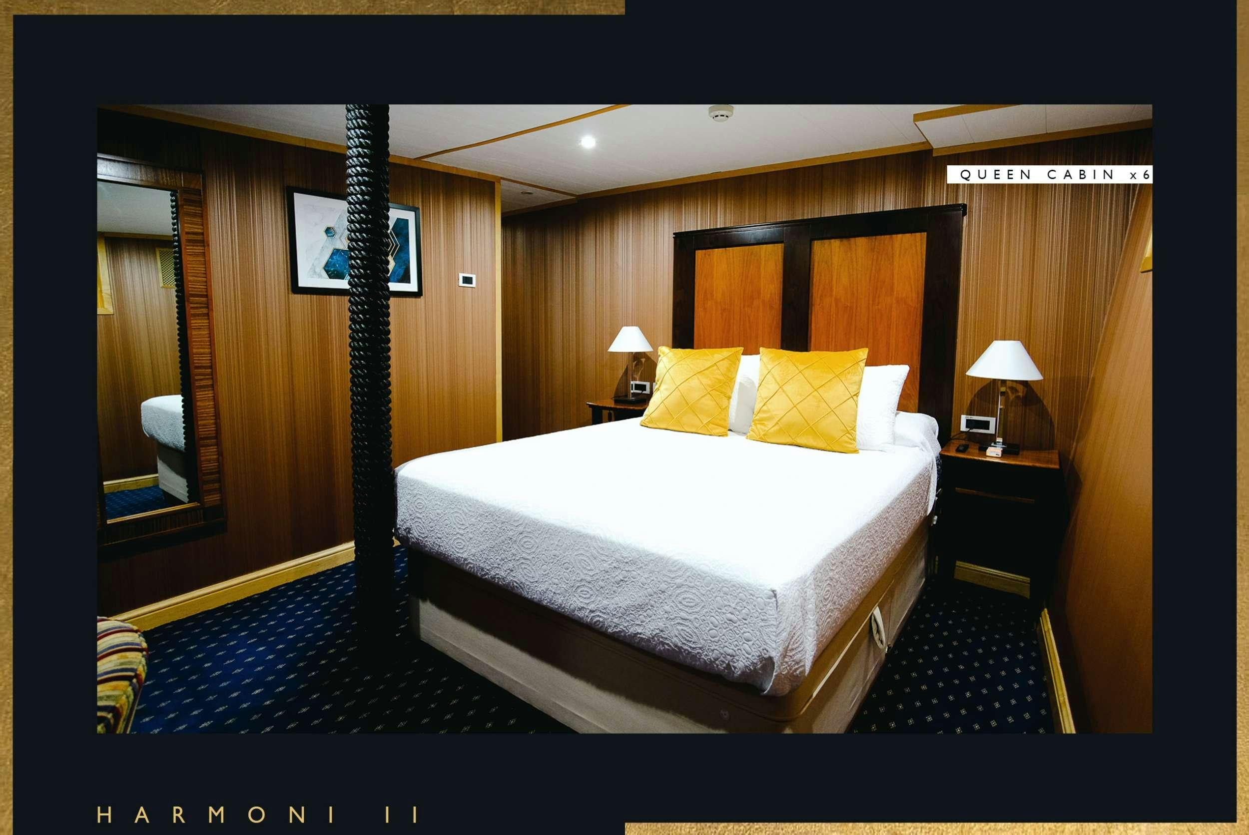a hotel room with a bed aboard HARMONY II Yacht for Charter
