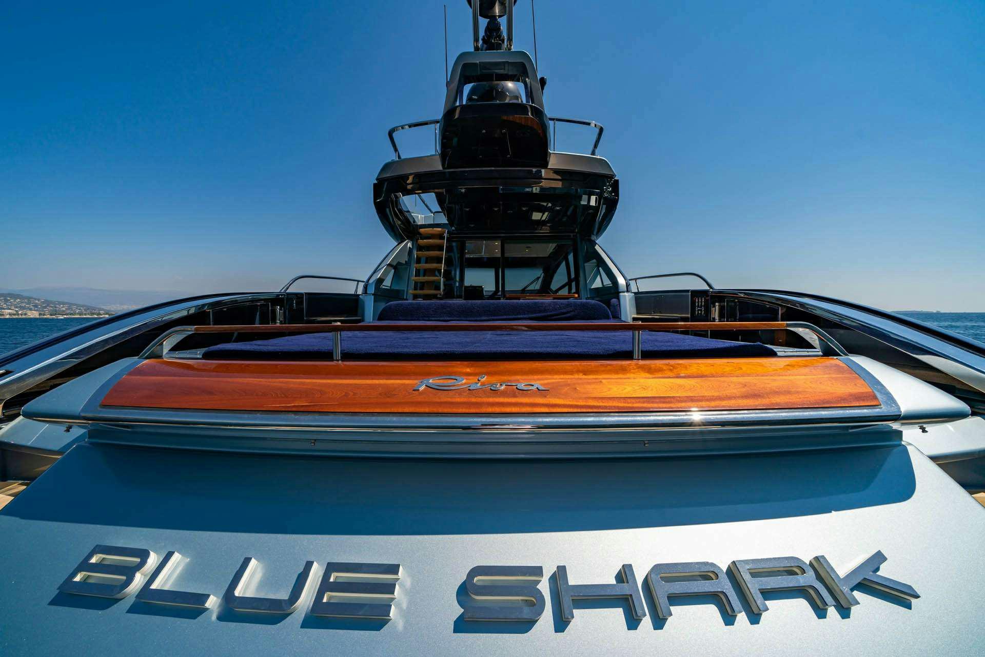 a boat with a large machine on the front aboard BLUE SHARK Yacht for Charter