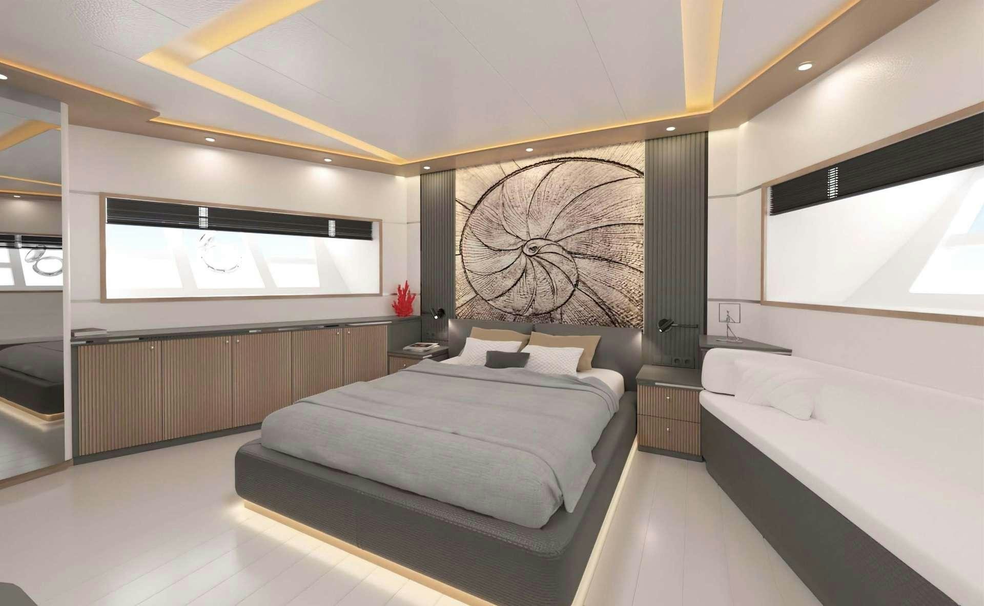 a room with a bed and a window aboard LAVIN Yacht for Charter