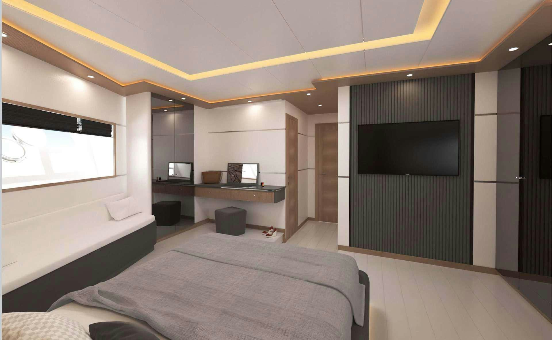 a room with a bed and a tv aboard LAVIN Yacht for Charter