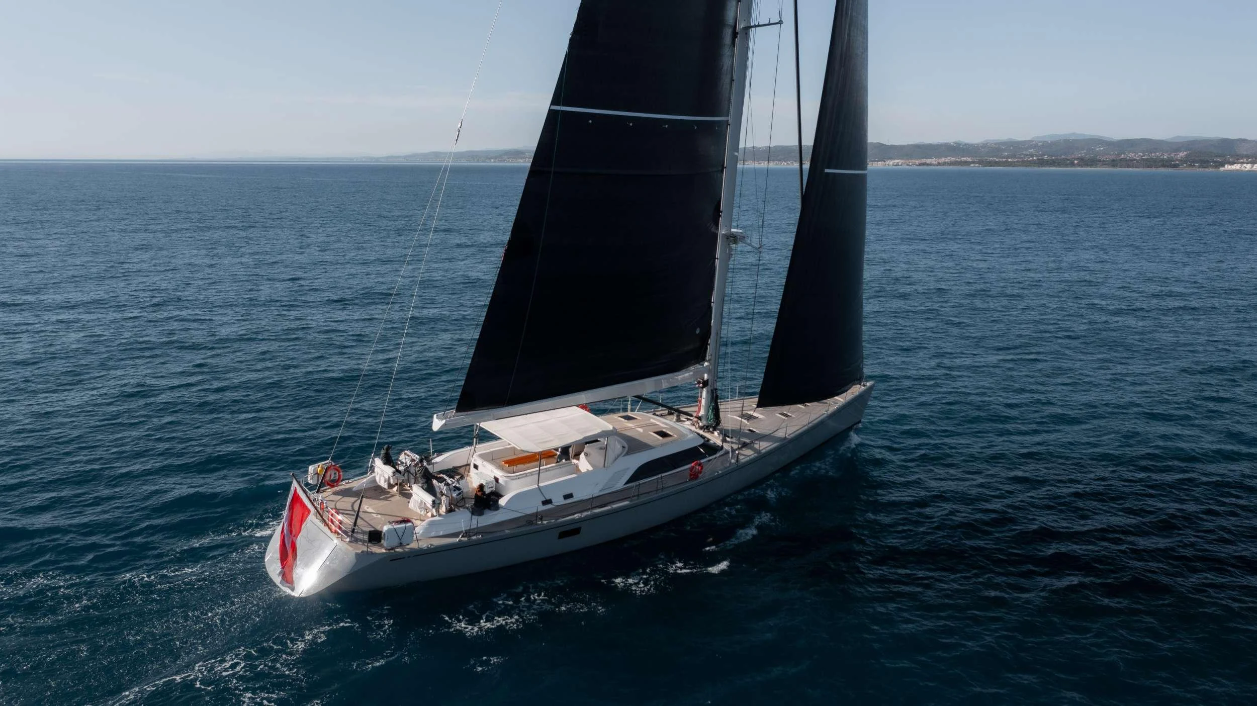 a sailboat on the water aboard VARSOVIE Yacht for Charter