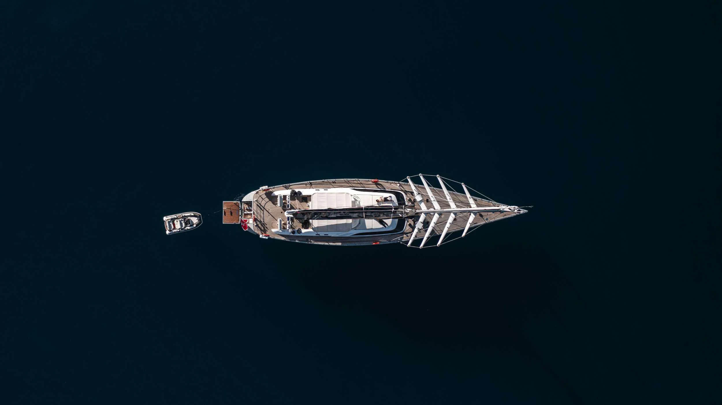 a silver and gold car aboard VARSOVIE Yacht for Charter