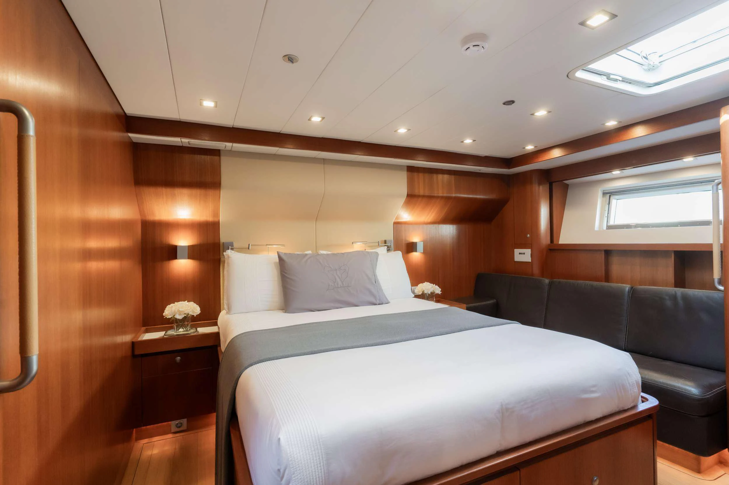a bed in a room aboard VARSOVIE Yacht for Charter