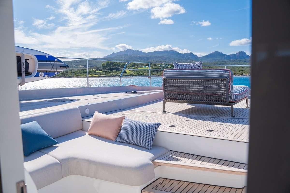 a room with a bed and a view of mountains aboard SEVENTY8 Yacht for Charter
