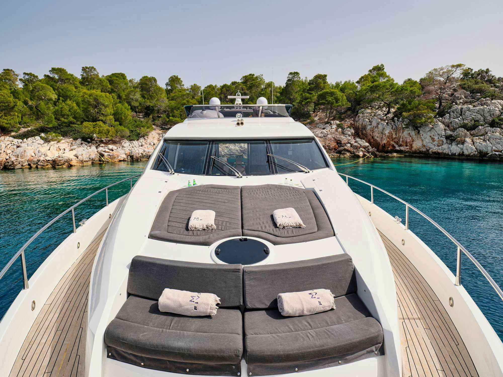 a boat on a body of water aboard M FIVE Yacht for Charter