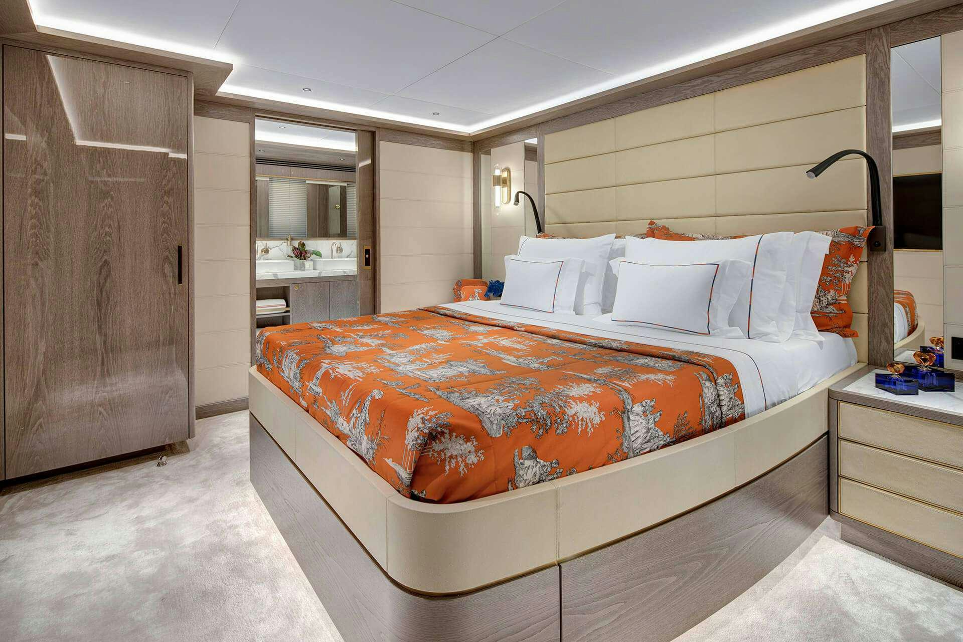 a bed in a hotel room aboard SAINT Yacht for Charter