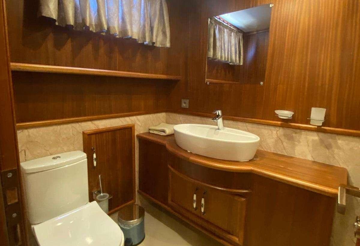 a bathroom with a sink and toilet aboard LA MIA STELLA Yacht for Charter