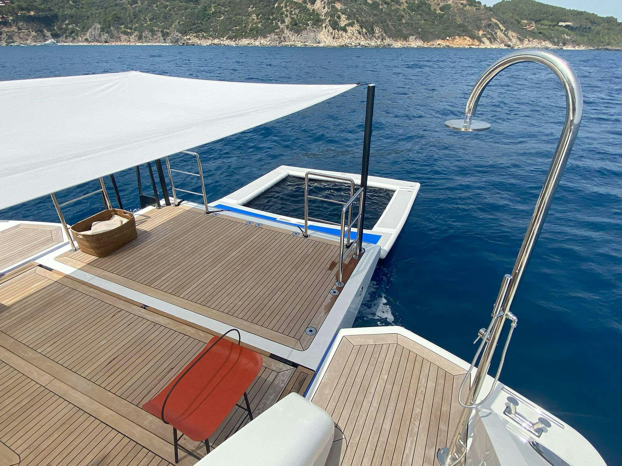 a boat on the water aboard ANDIAMO Yacht for Charter