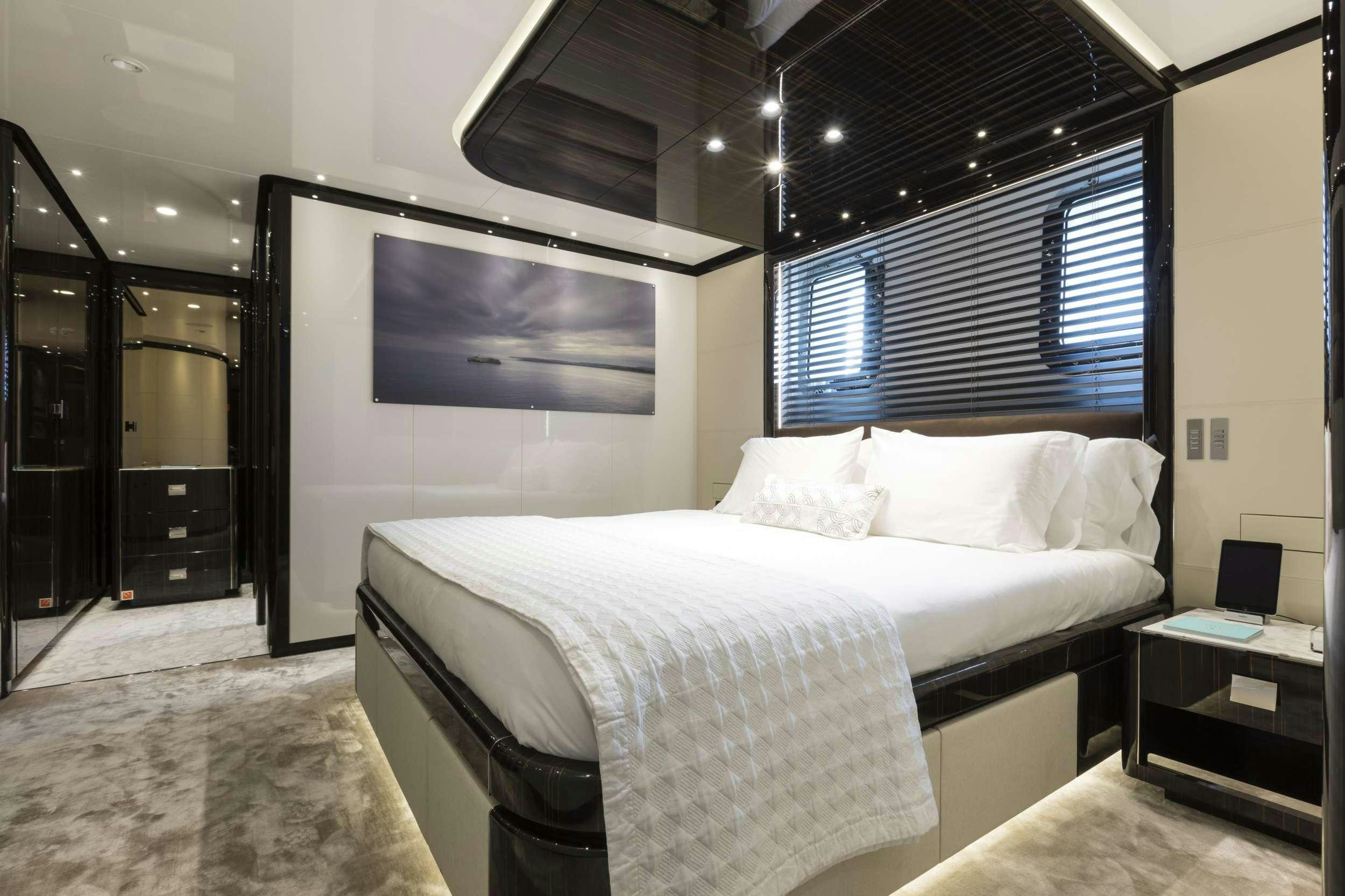 a bed in a room aboard ANDIAMO Yacht for Charter