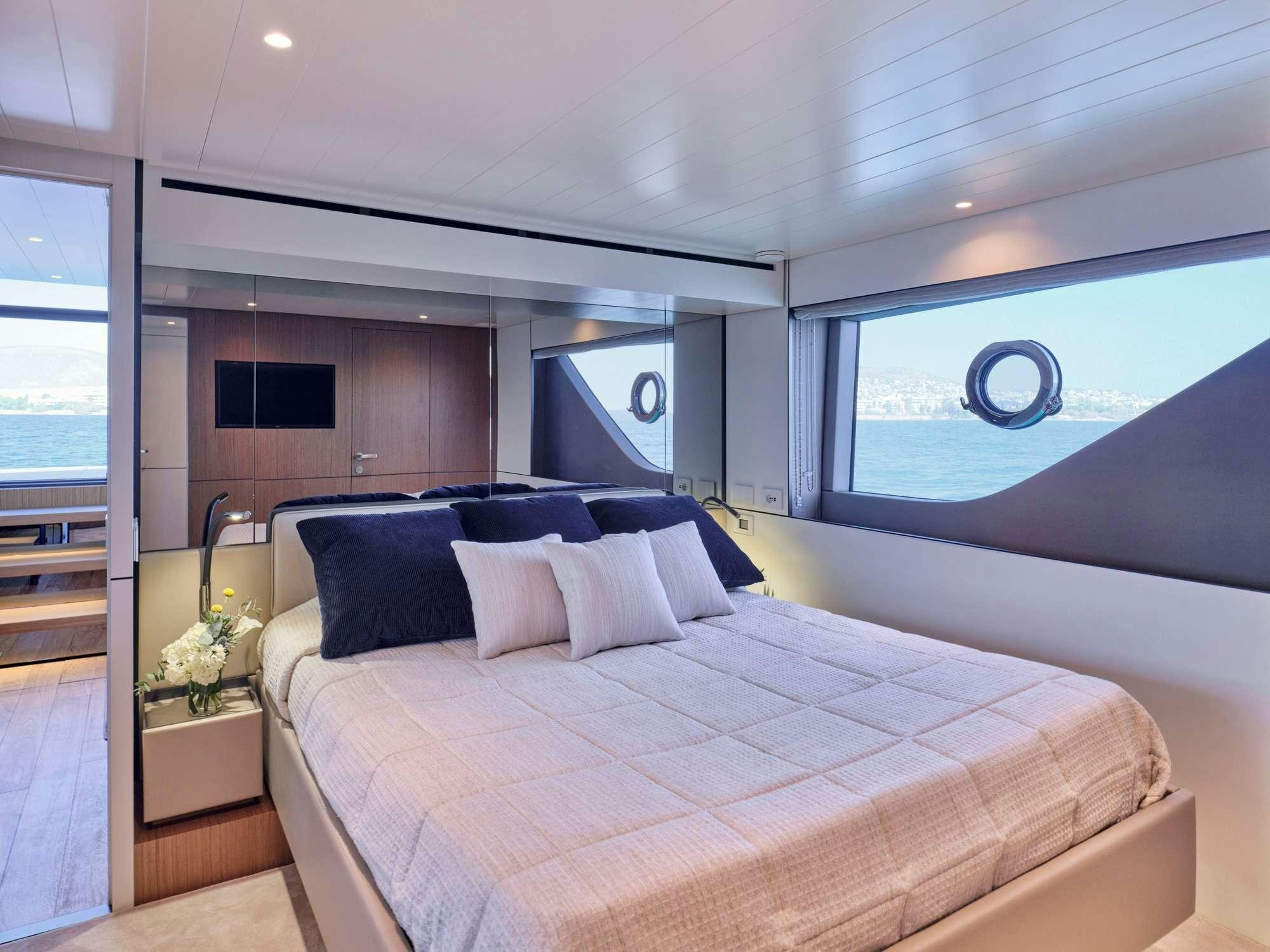 a large bed in a room aboard DUCHESS Yacht for Charter