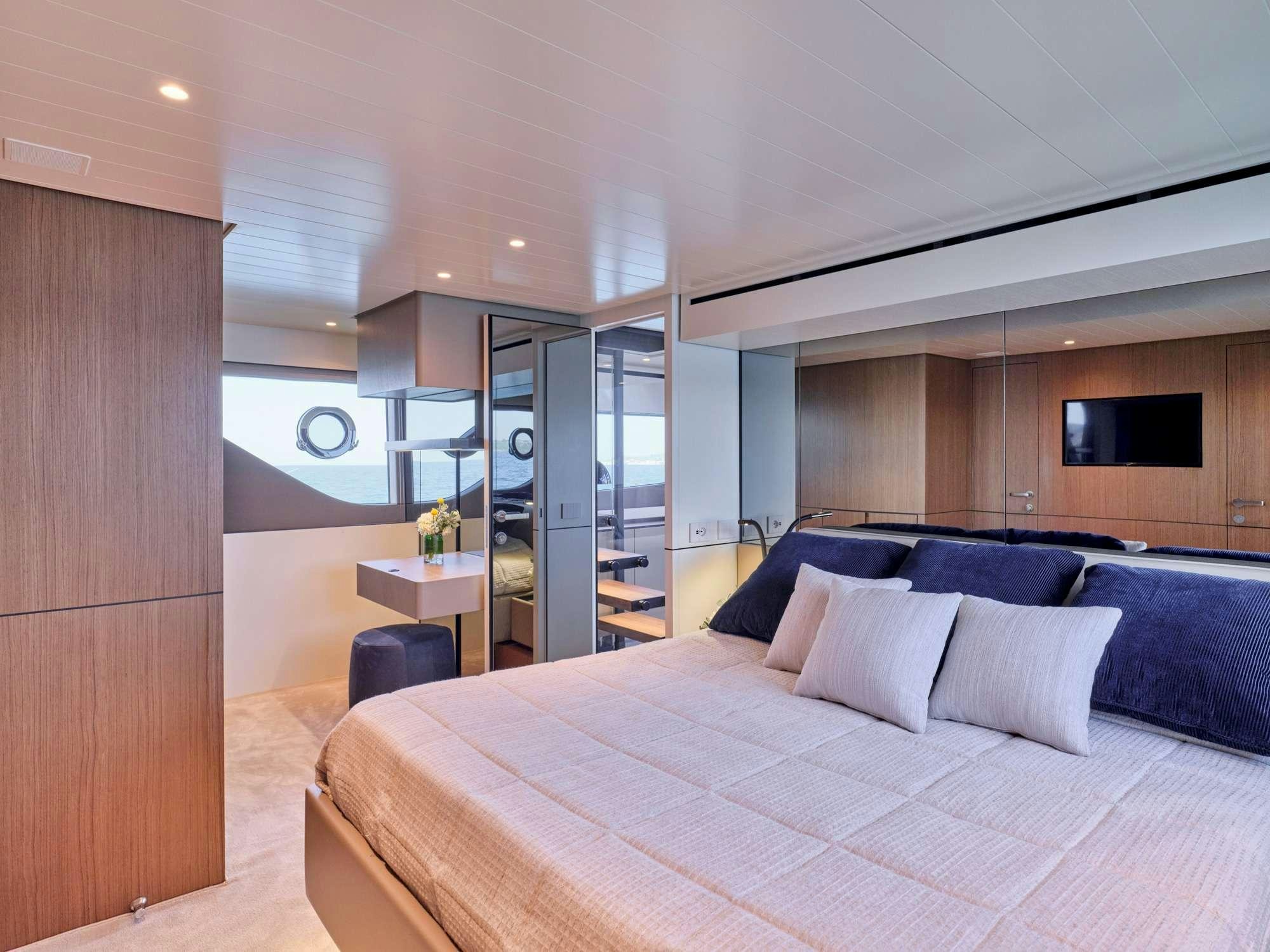 a large bed in a room aboard DUCHESS Yacht for Charter