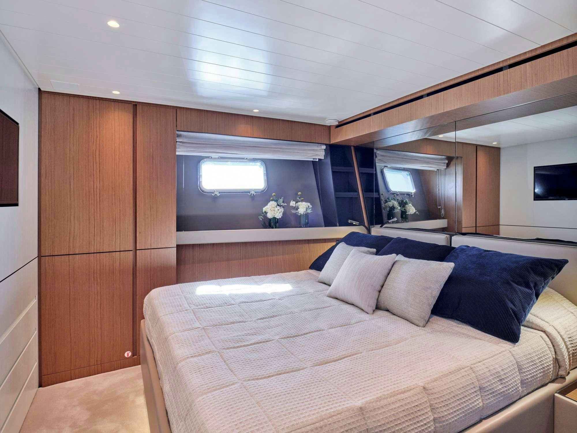 a bed in a room aboard DUCHESS Yacht for Charter