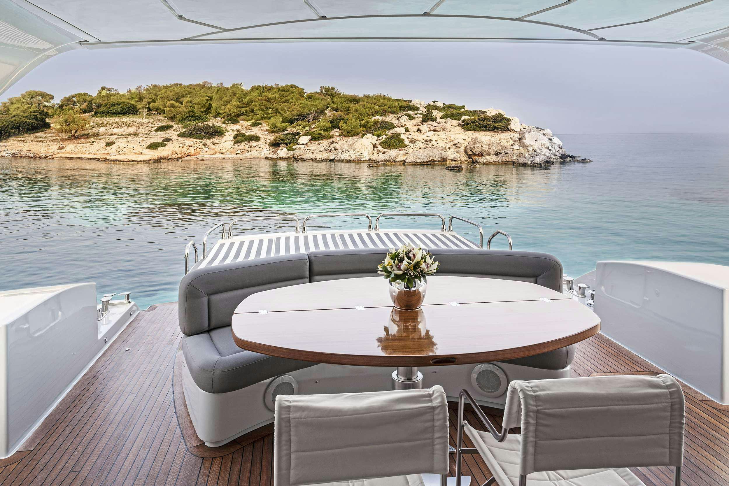 a boat on a table aboard DUNE Yacht for Charter