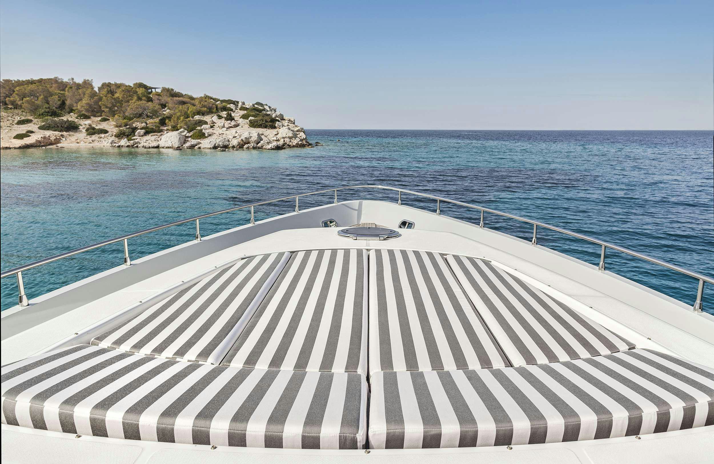 a white boat on the water aboard DUNE Yacht for Charter
