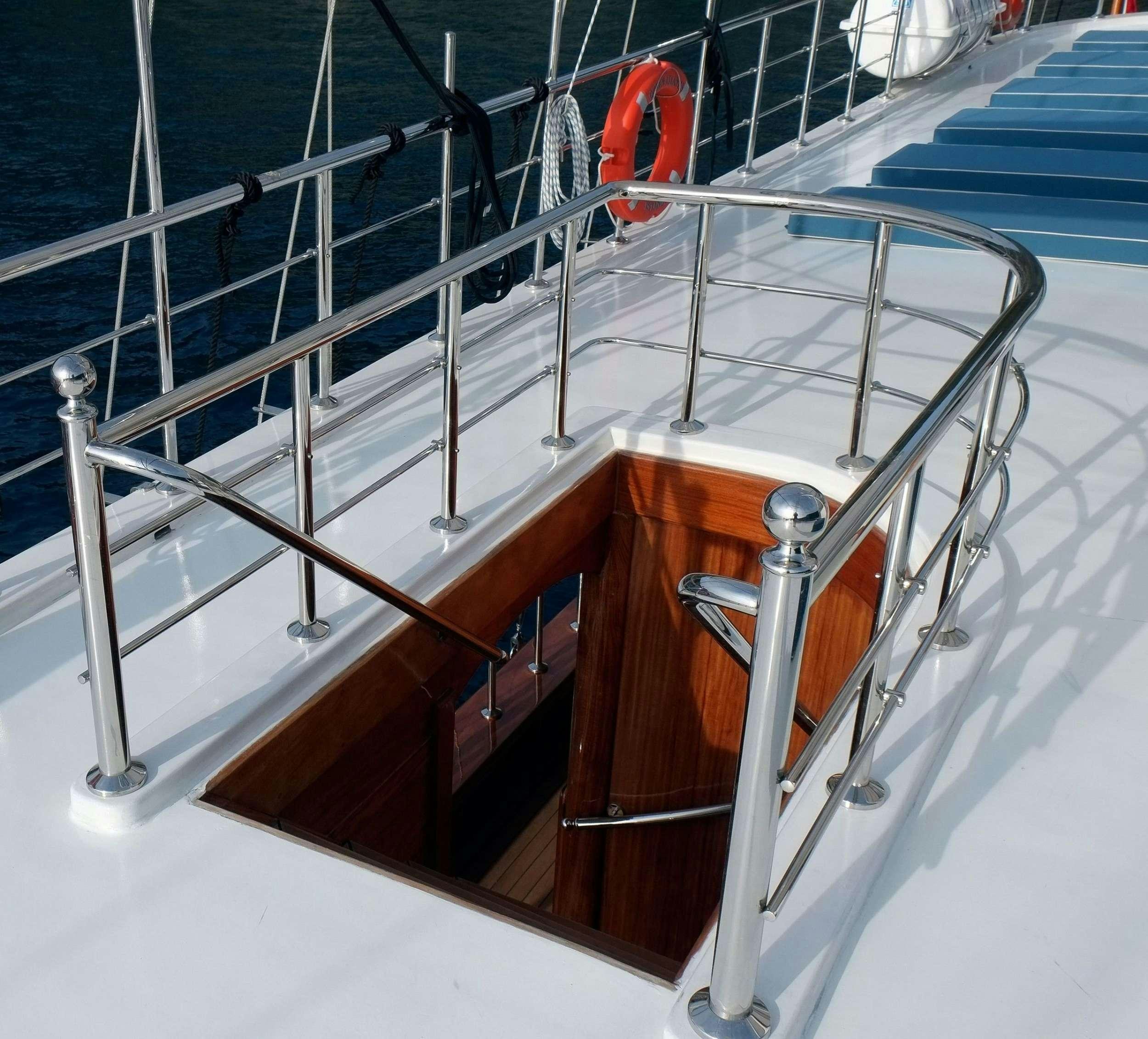 a metal railing with metal railings aboard QUEEN ATLANTIS Yacht for Charter