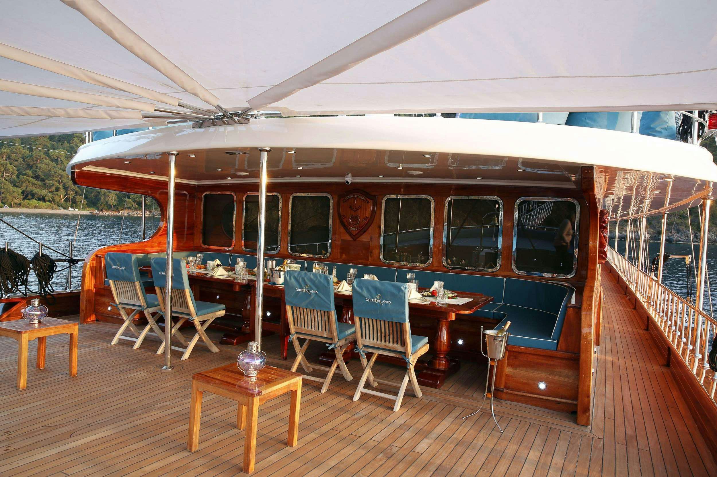 a boat on the water aboard QUEEN ATLANTIS Yacht for Charter