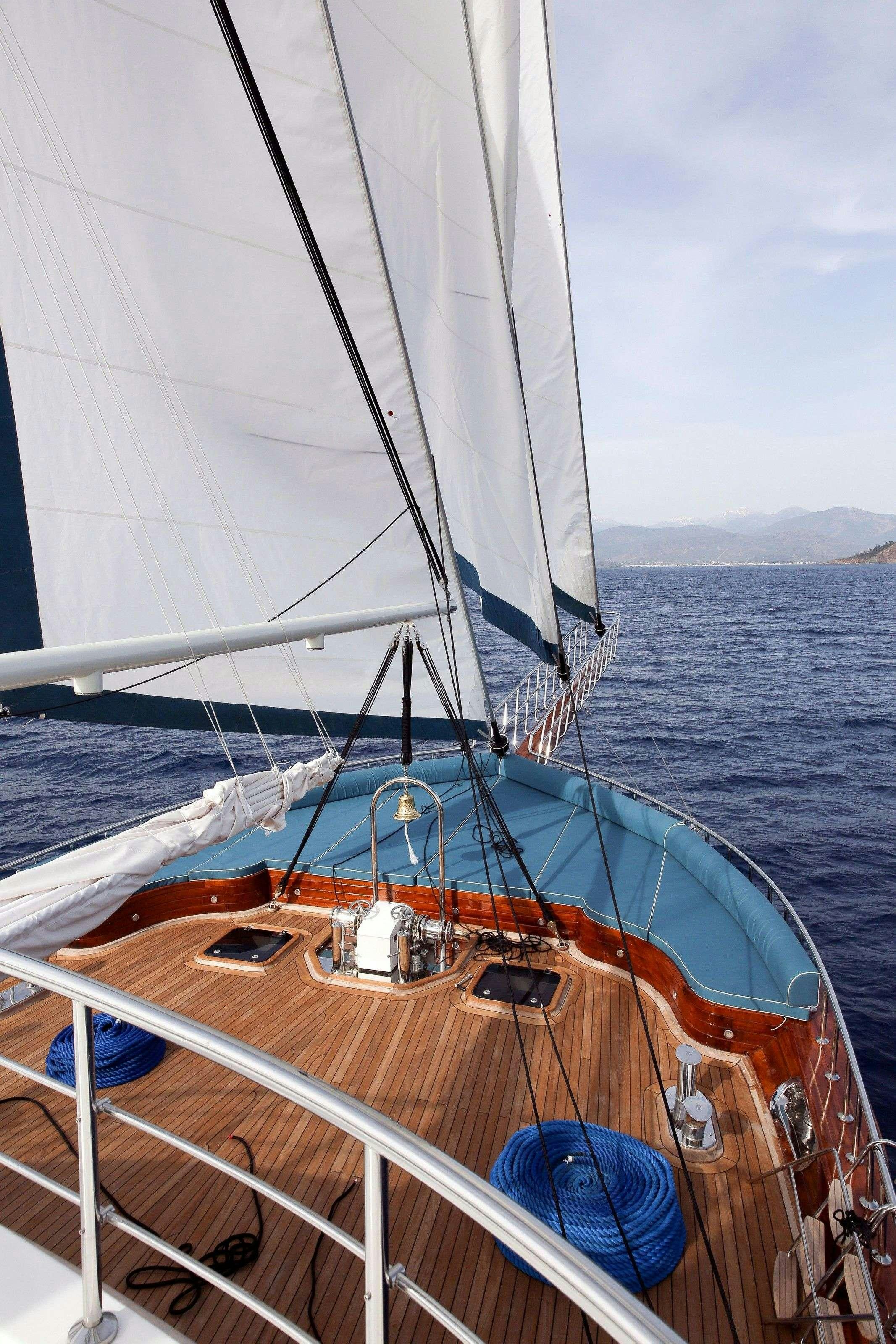 a boat on the water aboard QUEEN ATLANTIS Yacht for Charter