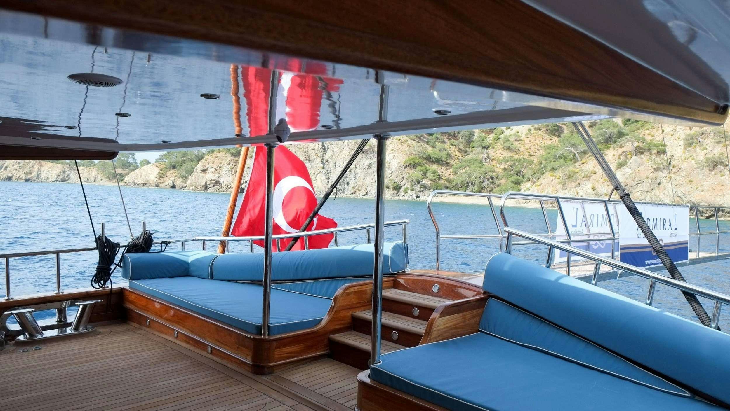 a boat on the water aboard QUEEN ATLANTIS Yacht for Charter