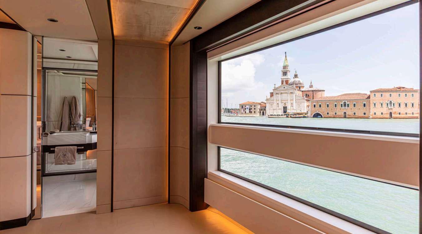 a room with a window and a sink aboard VAYUS Yacht for Charter