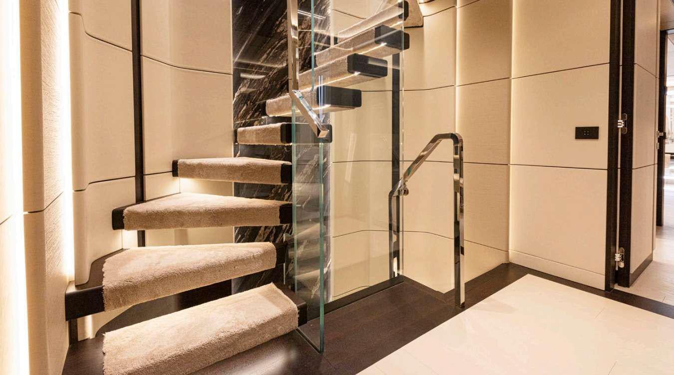a set of stairs in a room aboard VAYUS Yacht for Charter