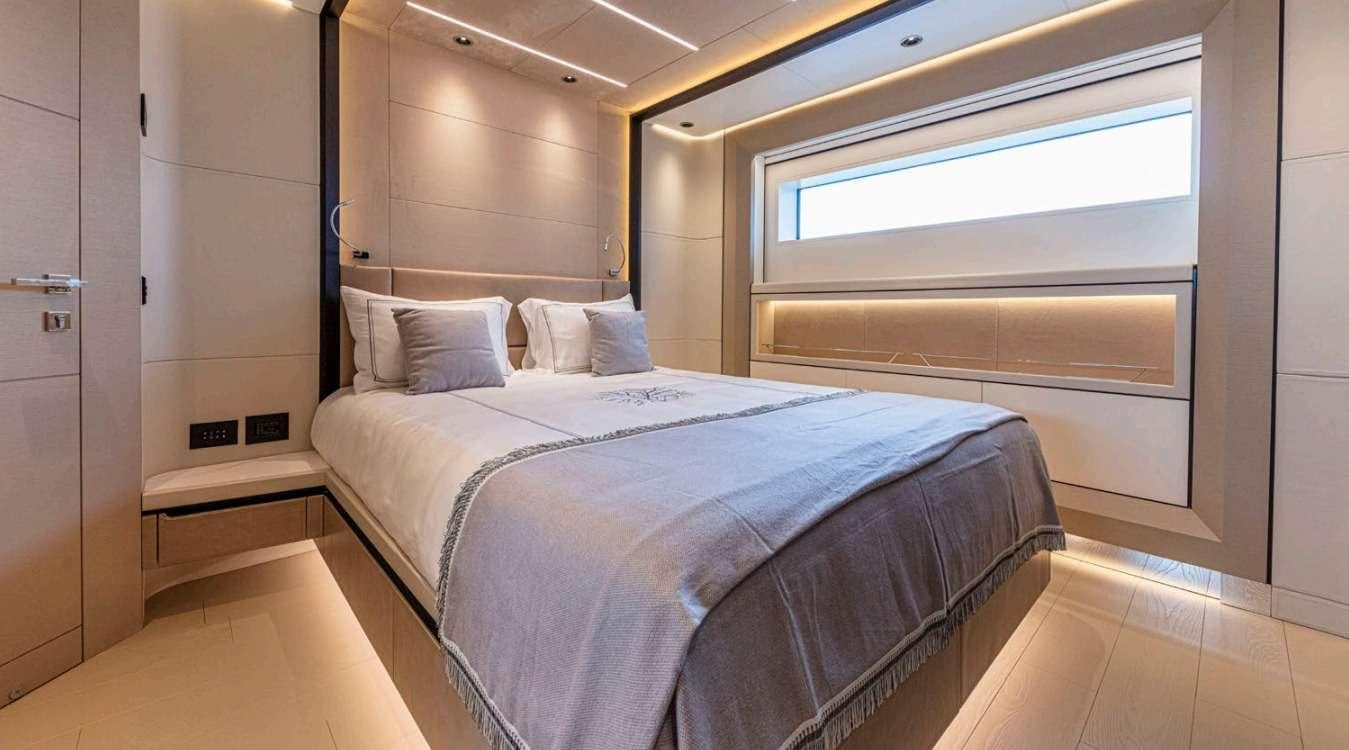 a bed in a room aboard VAYUS Yacht for Charter