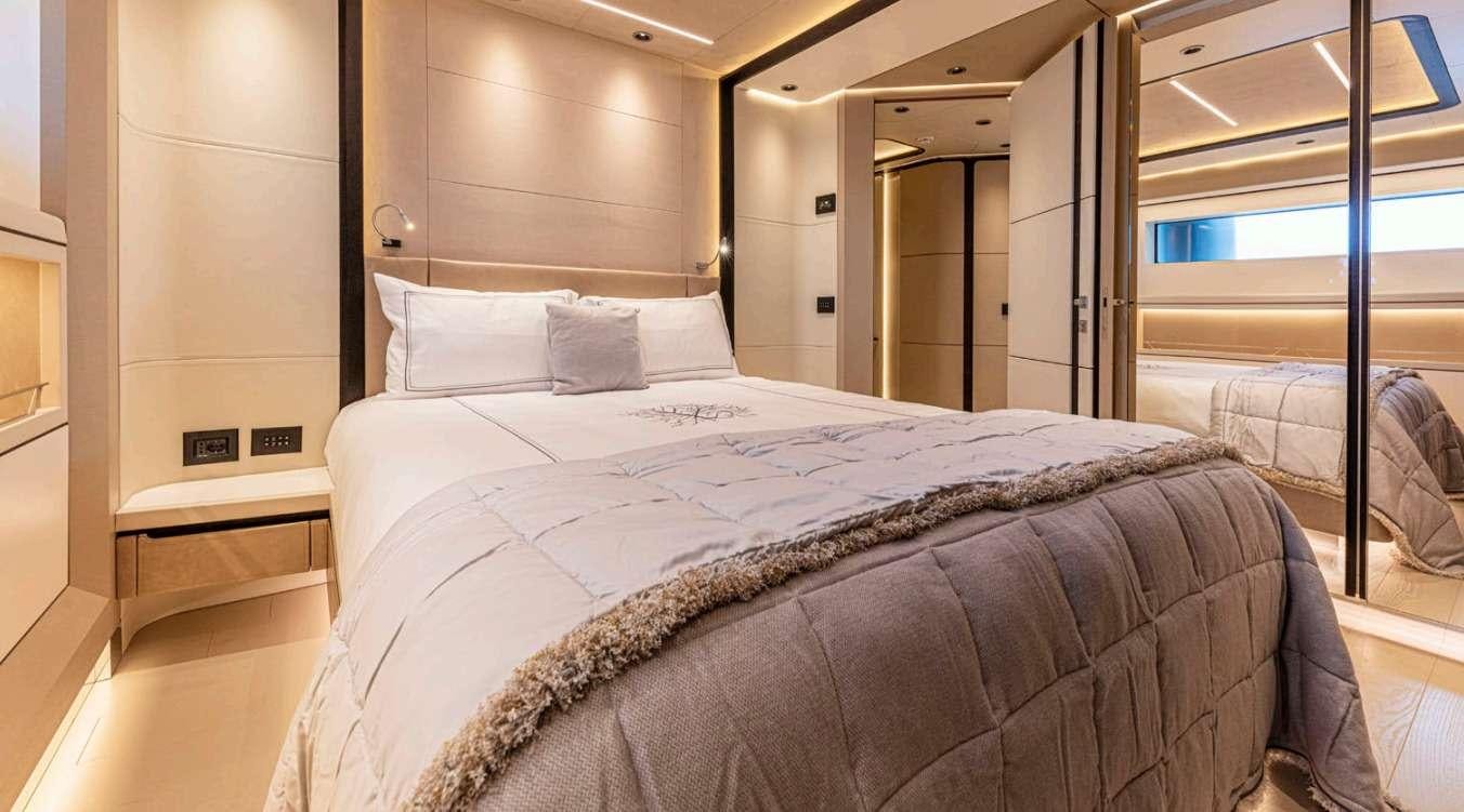 a bed in a room aboard VAYUS Yacht for Charter