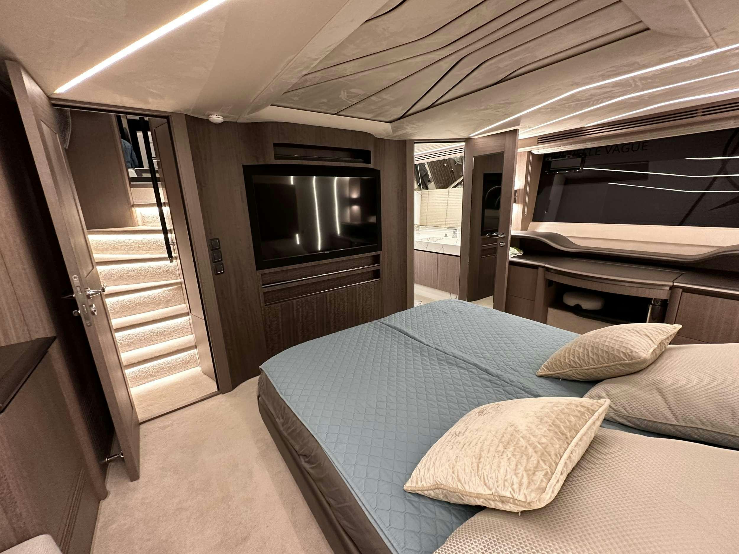 a bed in a room aboard PARADISE Yacht for Charter
