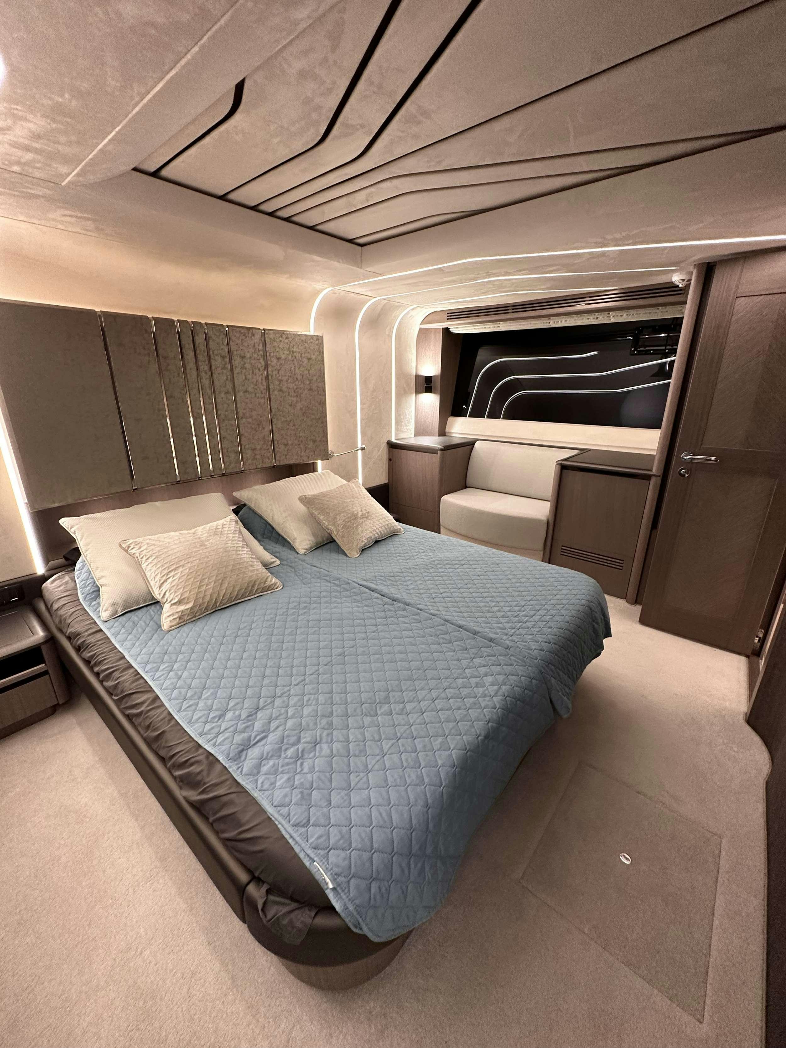 a bed in a room aboard PARADISE Yacht for Charter