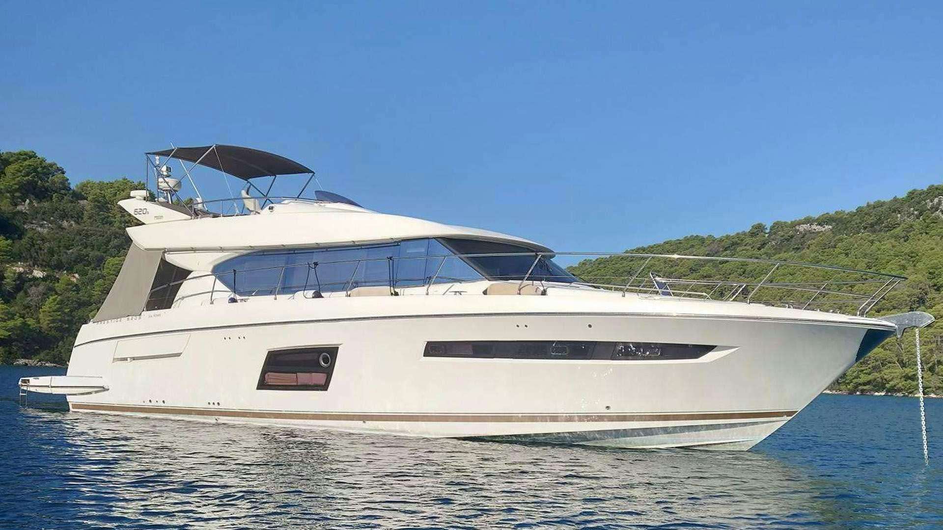 a white yacht on the water aboard SIX ROSES Yacht for Charter