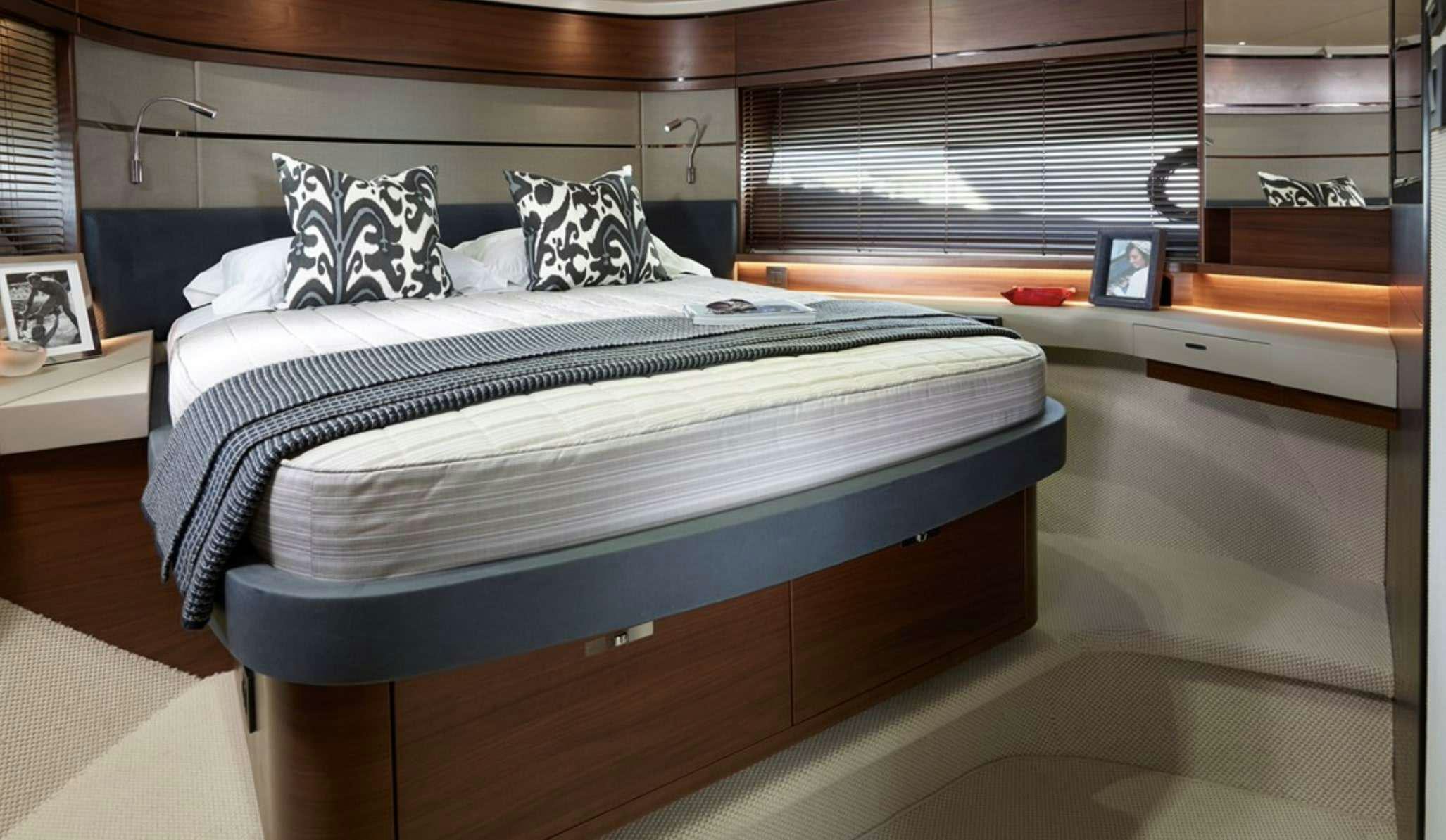 a bed in a room aboard FAR & AWAY Yacht for Charter