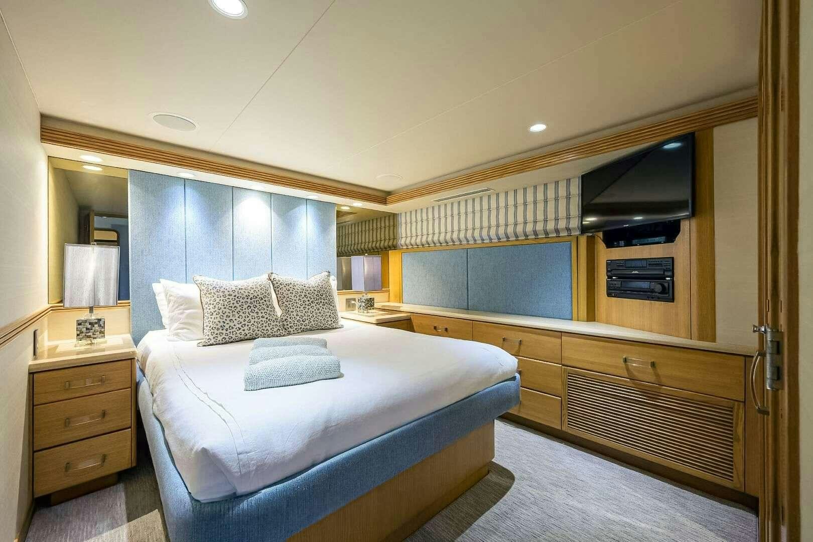 a hotel room with a bed aboard HARD TIMES Yacht for Charter