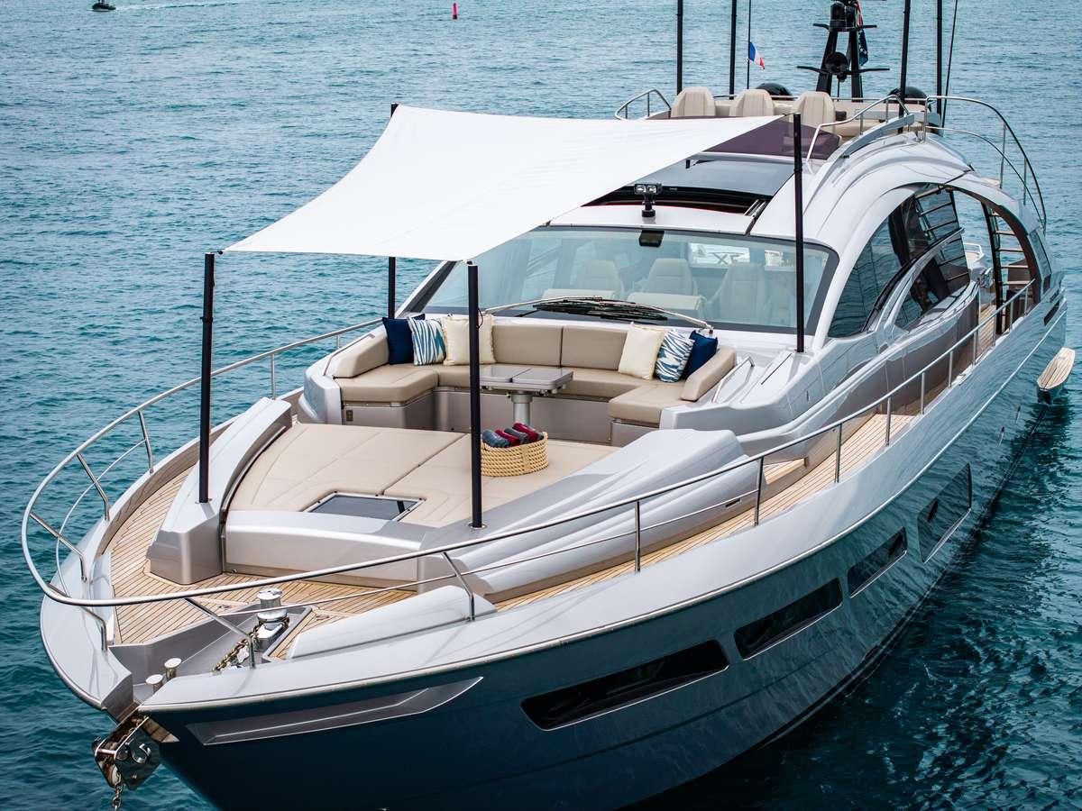 a white boat on the water aboard CHERRY Yacht for Charter