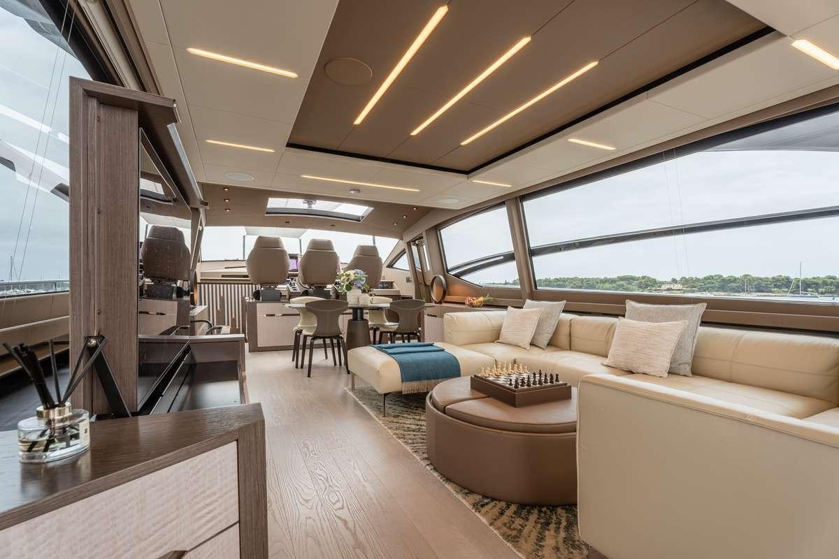 a living room with a couch and a table aboard CHERRY Yacht for Charter